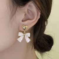 Alloy Heart Accent Bow Dangle Earrings