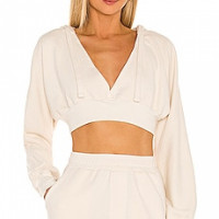 Michael Costello x REVOLVE Cropped Surplice Hoodie in Ivory | REVOLVE