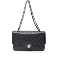 Double flap shoulder bag