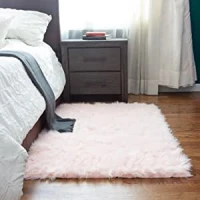 Amazon.com: Super Area Rugs Ultra Soft &amp; Fluffy Faux Sheepskin Rug, Light Pink 3 x 5 Feet Carpet for Bedroom Living Room : Home &amp; Kitchen
