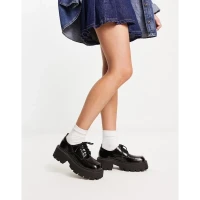 Truffle Collection chunky lace up shoes with exaggerated sole in black