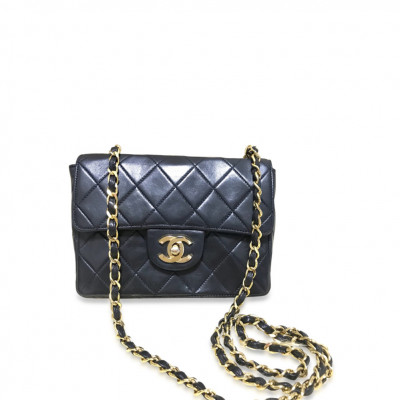 Vintage Chanel Black Leather 2.55 Classic Mini Flap Chain Shoulder Bag With Gold Tone Cc Closure.