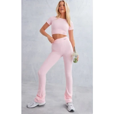 PRETTYLITTLETHING Baby Pink Sport Metal Badge Sculpt High Waist Flare Pants