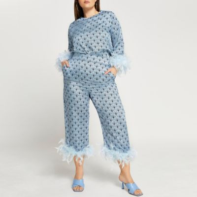Plus blue feather print hem trousers