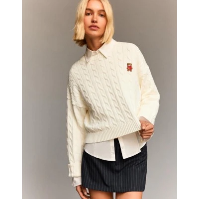 Embroidered cable-knit sweater