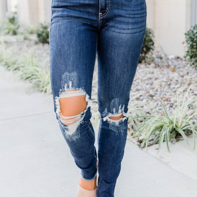 The Kallista Dark Wash Distressed Crop Jeans