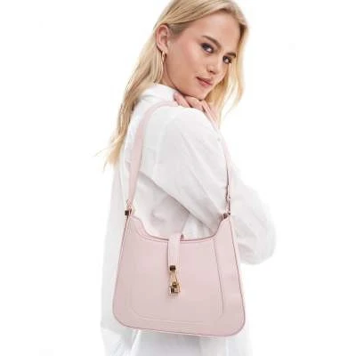 Glamorous shoulder bag with gold clasp detail in pale pink
